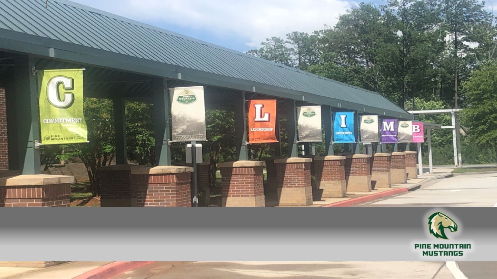 Front of School with Mustang Logo